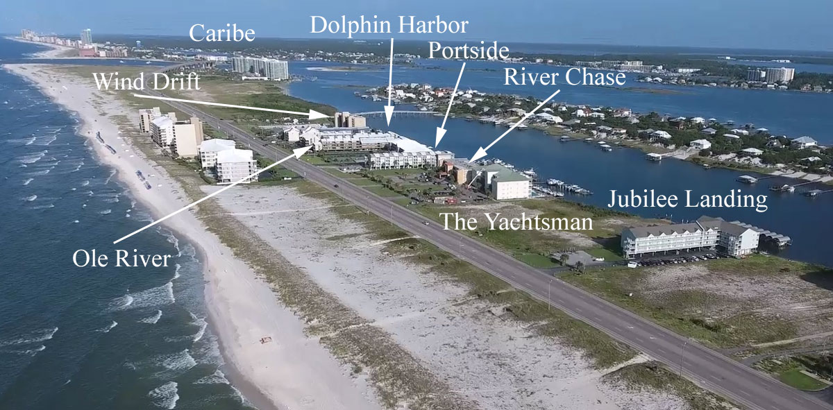 Aerial view of condos in Orange Beach with gulf access and boat slips